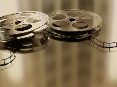 Two movie reels beside each other