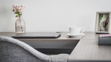 Office Workspace with flower arrangement on desk