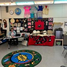 Indigenous room full of indigenous art, drums, and décor.